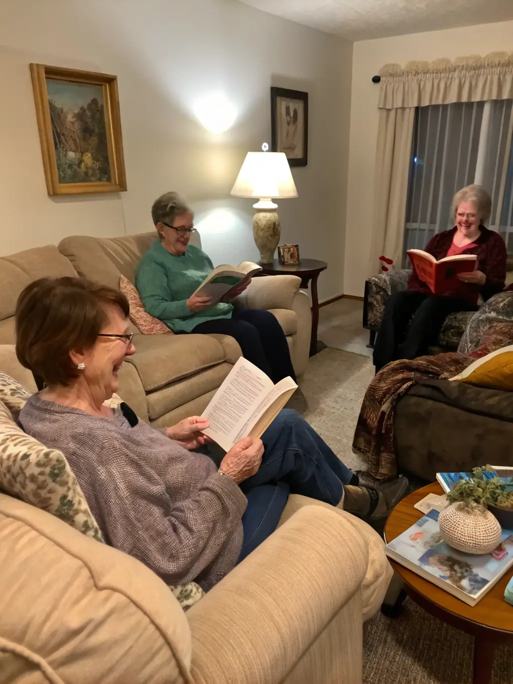 A group of residents and staff participating in a community wellbeing workshop, with smiling faces and supportive interactions in a communal space.